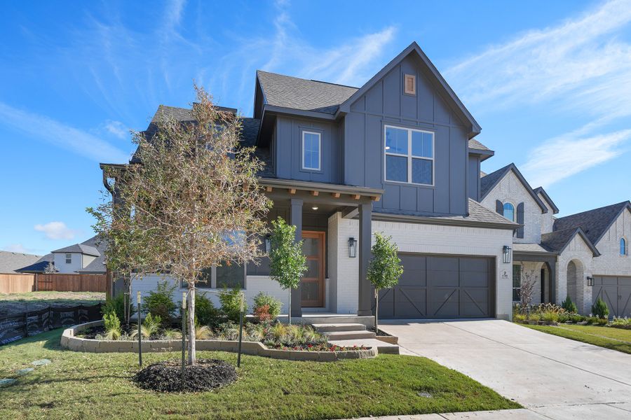 Front exterior of a new home in Aster Park, McKinney, TX, highlighting curb appeal (Image 2). Front exterior of a new home in Aster Park, McKinney, TX, highlighting curb appeal (Image 2).