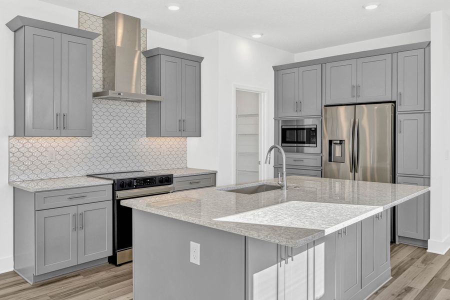 Representative furnished interior of a home built from the Whitney by Rockwell Homes in Harvest at Ovation - Townhomes, Winter Garden (Image 5). Representative furnished interior of a home built from the Whitney by Rockwell Homes in Harvest at Ovation - Townhomes, Winter Garden (Image 5).