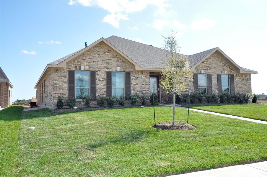 Front exterior of a new home in , League City, TX, highlighting curb appeal (Image 19).