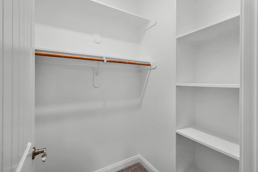 Closet in secondary bedroom with built ins Closet in secondary bedroom with built ins