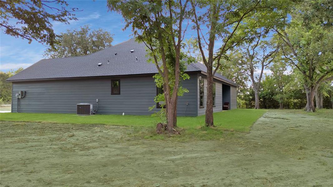 Front exterior of a new home in , Greenville, TX, highlighting curb appeal (Image 2). Front exterior of a new home in , Greenville, TX, highlighting curb appeal (Image 2).
