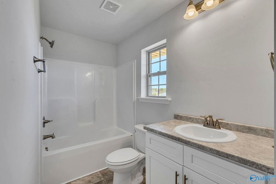 Representative furnished interior of a home built from the 2200 by Adams Homes in Winding Oaks, Weeki Wachee (Image 9). Representative furnished interior of a home built from the 2200 by Adams Homes in Winding Oaks, Weeki Wachee (Image 9).