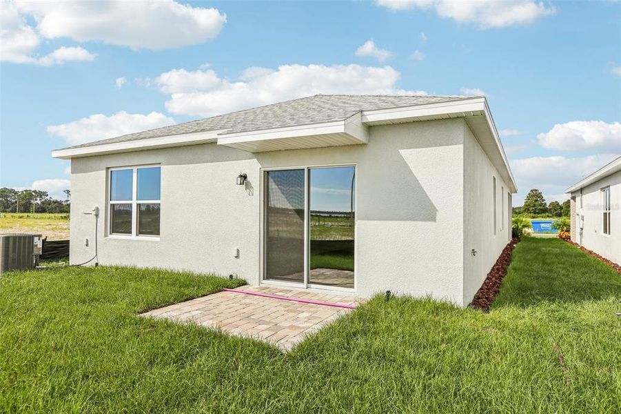Front exterior of a new home in Willowbrook North, Winter Haven, FL, highlighting curb appeal (Image 2). Front exterior of a new home in Willowbrook North, Winter Haven, FL, highlighting curb appeal (Image 2).
