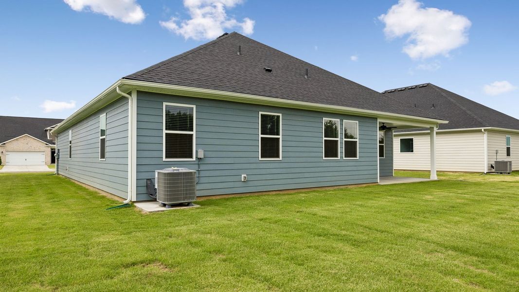Exterior details and patio area of a home in Reserve at Hickory Ridge, Columbia (Image 30).