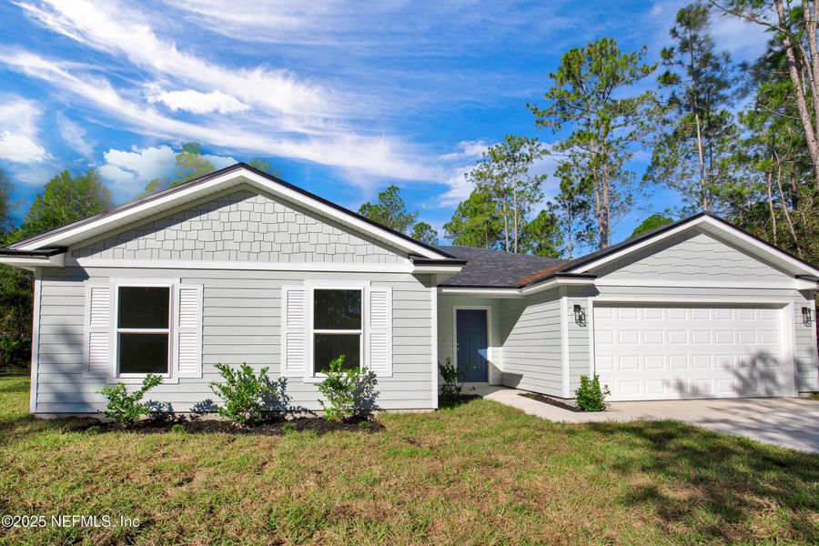 Front exterior of a new home in , Hastings, FL, highlighting curb appeal (Image 1). Front exterior of a new home in , Hastings, FL, highlighting curb appeal (Image 1).