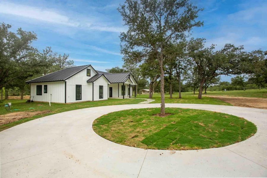 Front exterior of a new home in , Lockhart, TX, highlighting curb appeal (Image 27). Front exterior of a new home in , Lockhart, TX, highlighting curb appeal (Image 27).
