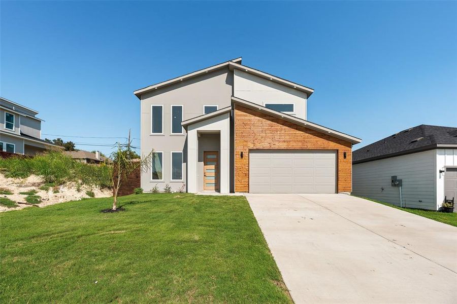 Front exterior of a new home in , Dallas, TX, highlighting curb appeal (Image 1). Front exterior of a new home in , Dallas, TX, highlighting curb appeal (Image 1).