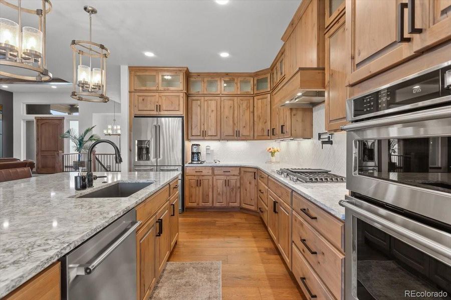 The HUGE Walk-In Pantry (not pictured) Boasts a Beverage Fridge, More Cabinets and Extra Quartz Countertops