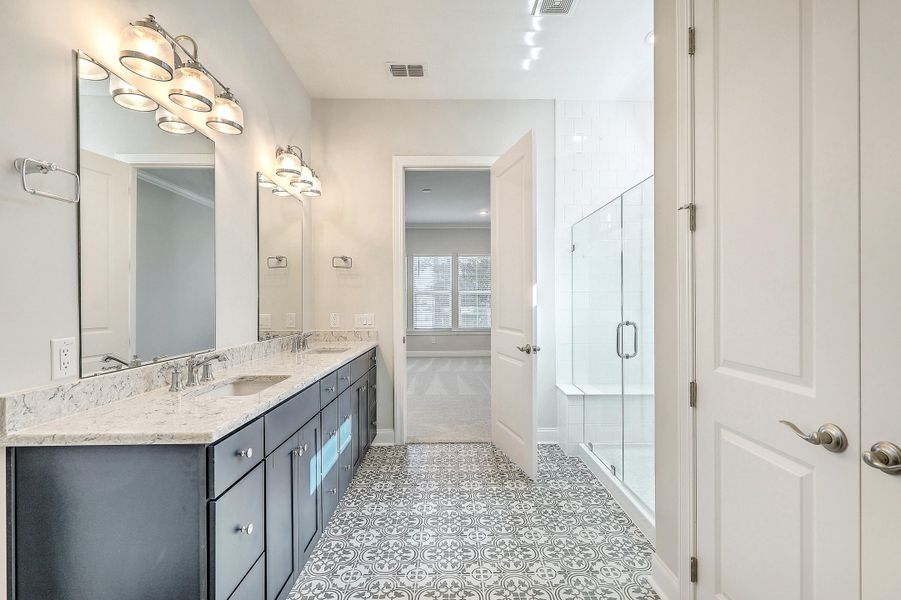 Furnished interior view inside a new home in K. Hovnanian's® Four Seasons at Lakes of Cane Bay, Summerville (Image 10).