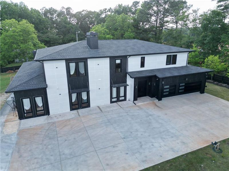 Front exterior of a new home in , Cumming, GA, highlighting curb appeal (Image 2). Front exterior of a new home in , Cumming, GA, highlighting curb appeal (Image 2).