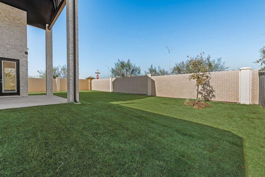 Exterior details and patio area of a home in Prairie Ridge, Venus (Image 4).