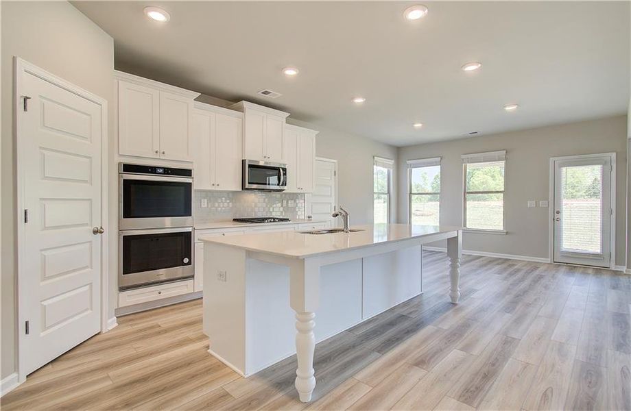 Furnished interior view inside a new home in Cambria at Traditions, Hampton (Image 5). Furnished interior view inside a new home in Cambria at Traditions, Hampton (Image 5).
