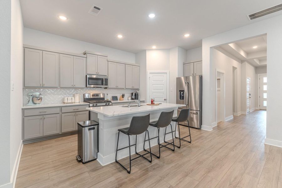 Furnished interior view inside a new home in Grand Central Park, Conroe (Image 7).