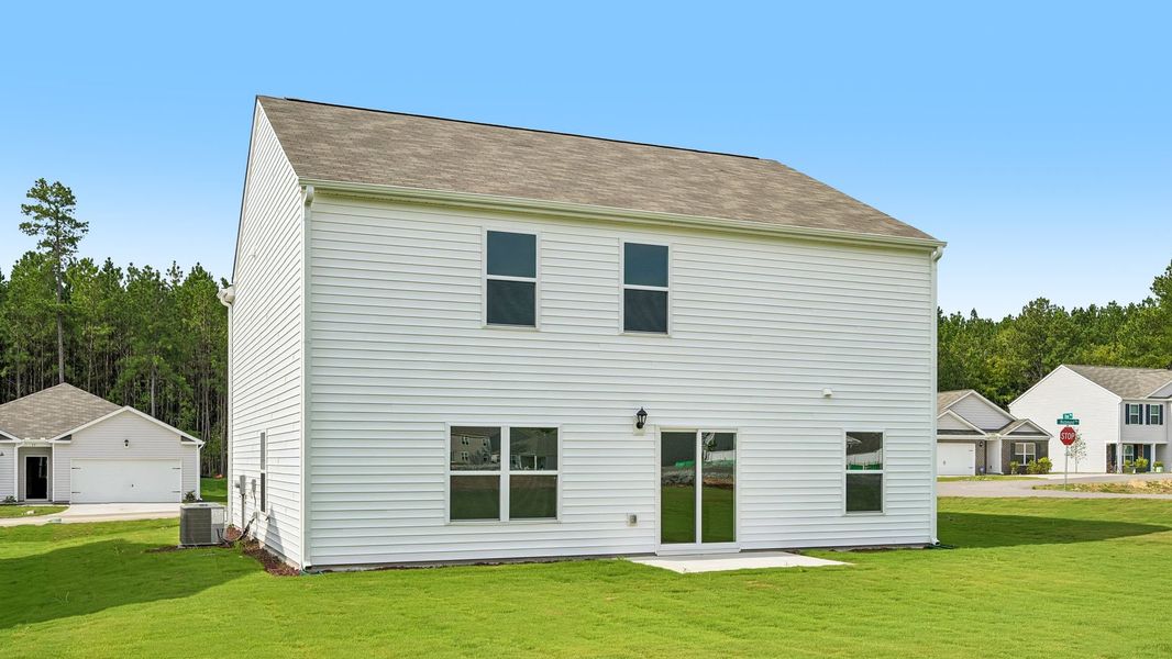 Exterior details and patio area of a home in Mangum Farms, Stem (Image 18).