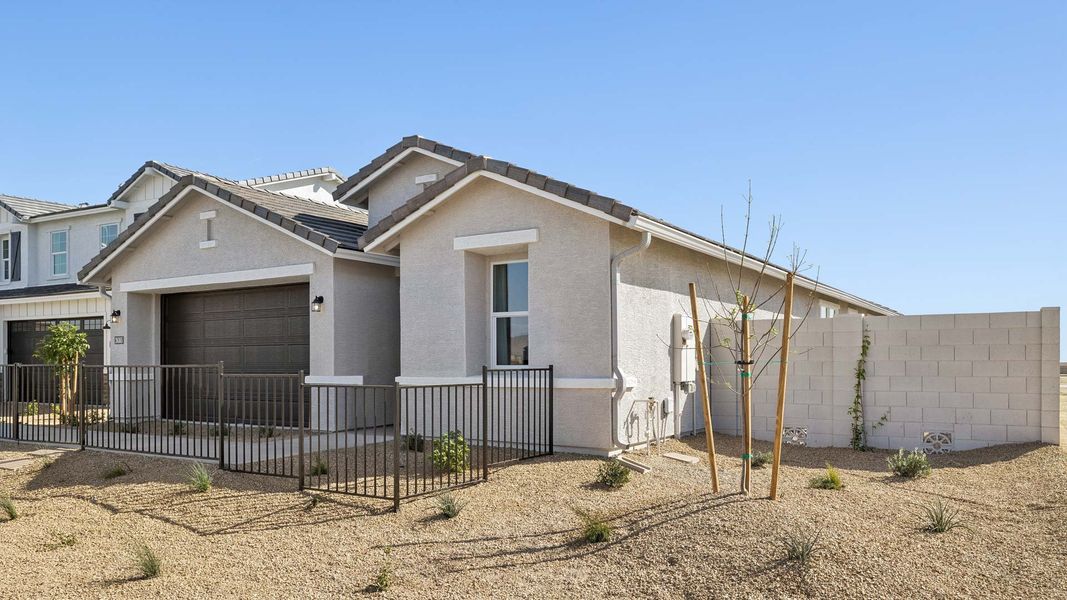Representative exterior photo of a completed home built from the Canyon by D.R. Horton in Westpark, Buckeye, AZ (Image 26).