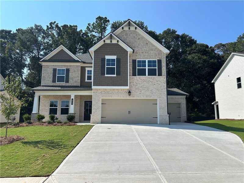 Front exterior of a new home in Rosewood Lake Estates, Hoschton, GA, highlighting curb appeal (Image 59).