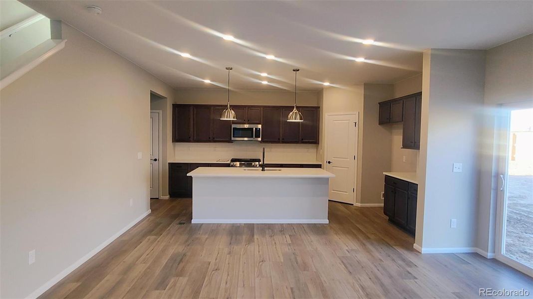 Furnished interior view inside a new home in The Cottages Collection at Ridgeline Vista, Brighton (Image 3).