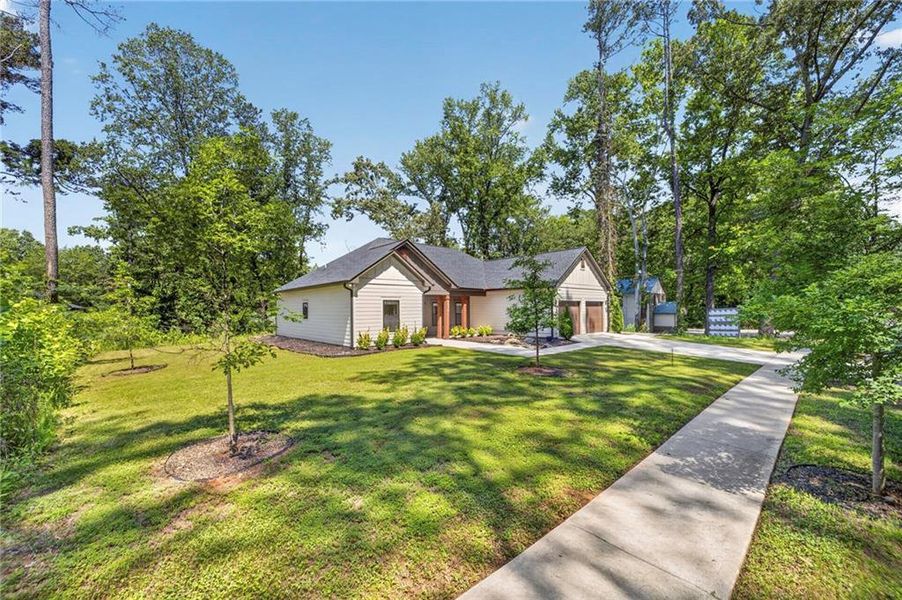 Front exterior of a new home in , Tucker, GA, highlighting curb appeal (Image 32).