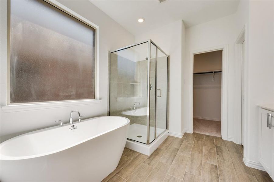 Bathroom with plus walk in shower