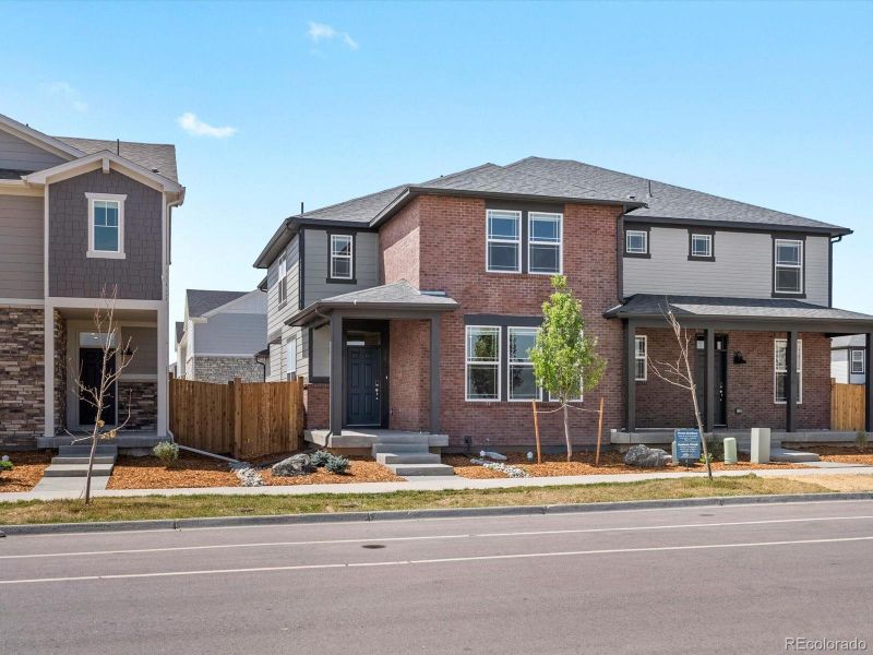 Front exterior of a new home in , Aurora, CO, highlighting curb appeal (Image 2). Front exterior of a new home in , Aurora, CO, highlighting curb appeal (Image 2).