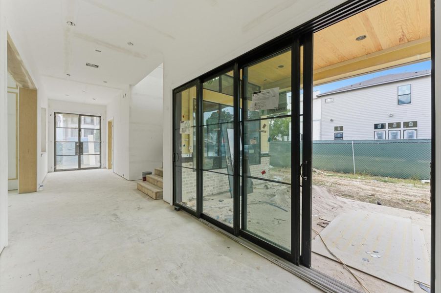 The 12 ft sliding doors open to the outdoor pavilion.