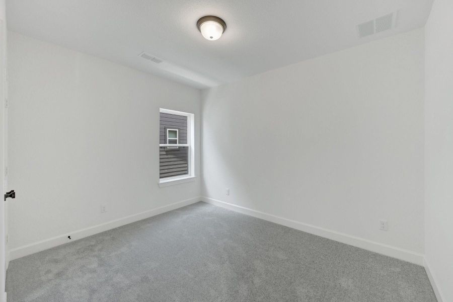 Spacious, unfurnished interior of a new home in Pomona - Grove Row Collection, Manvel (Image 27).