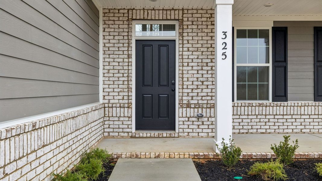 Representative exterior details of a home built from the Stonebrook II by D.R. Horton in Harvest Point, Spring Hill (Image 30). Representative exterior details of a home built from the Stonebrook II by D.R. Horton in Harvest Point, Spring Hill (Image 30).