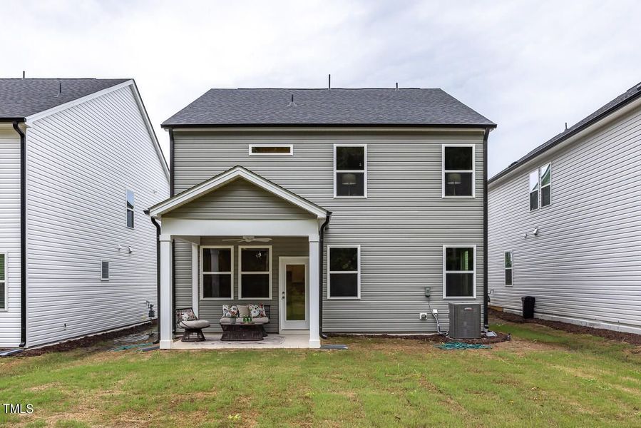 Front exterior of a new home in Gregory Village, Lillington, NC, highlighting curb appeal (Image 91).