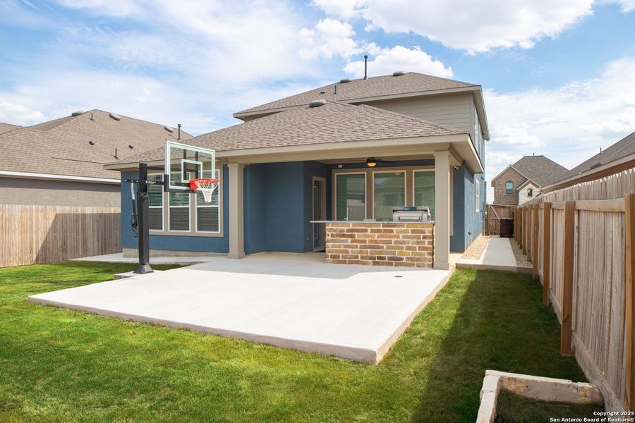 Front exterior of a new home in Ladera - High Point 45', San Antonio, TX, highlighting curb appeal (Image 13). Front exterior of a new home in Ladera - High Point 45', San Antonio, TX, highlighting curb appeal (Image 13).