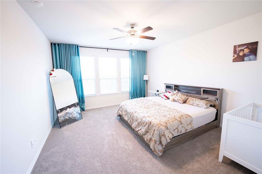Spacious room with light-toned carpet flooring and white painted walls Spacious room with light-toned carpet flooring and white painted walls