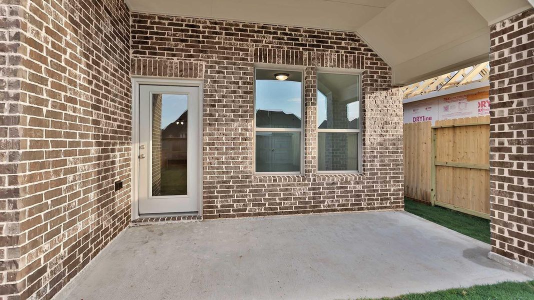 Exterior details and patio area of a home in Candela 40', Richmond (Image 3). Exterior details and patio area of a home in Candela 40', Richmond (Image 3).