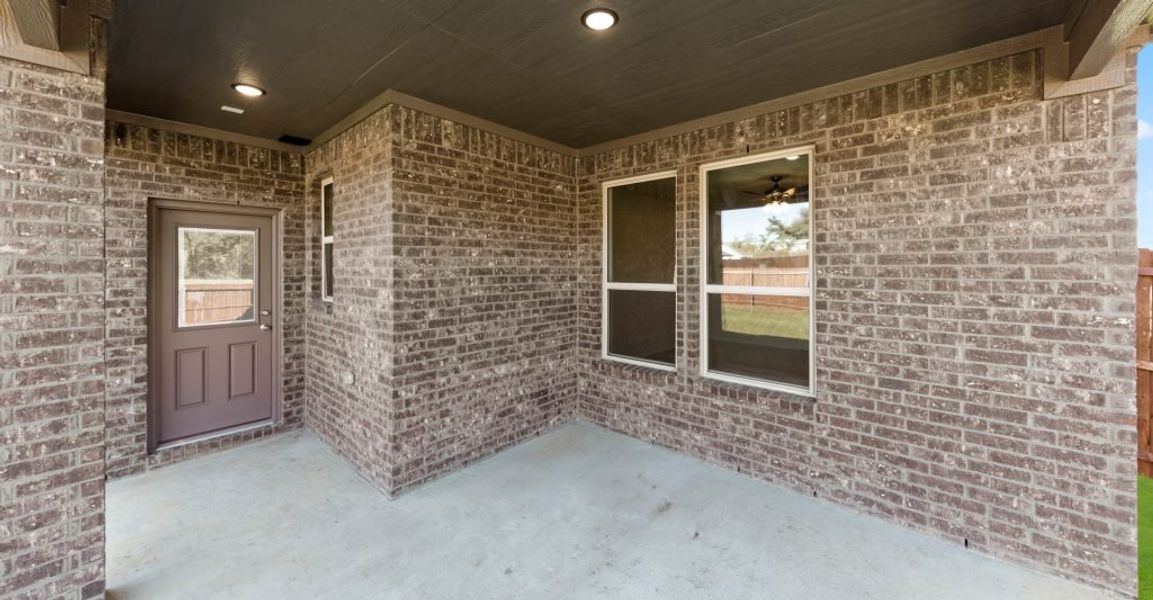 Representative exterior photo of a completed home built from the Raleigh by Impression Homes in ValleyBrooke, Mesquite, TX (Image 26).