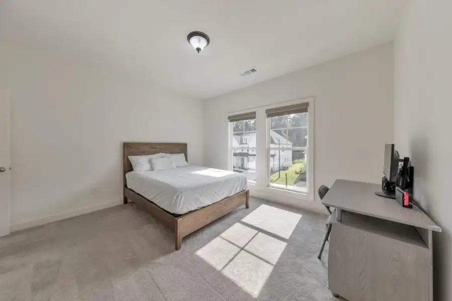 Furnished interior view inside a new home in , Woodstock (Image 18).
