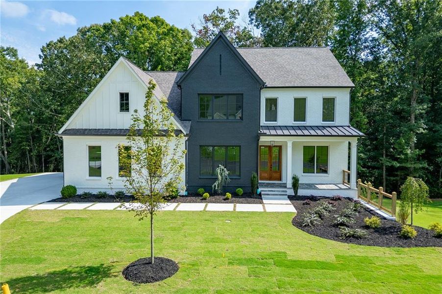 Front exterior of a new home in , Buford, GA, highlighting curb appeal (Image 36).
