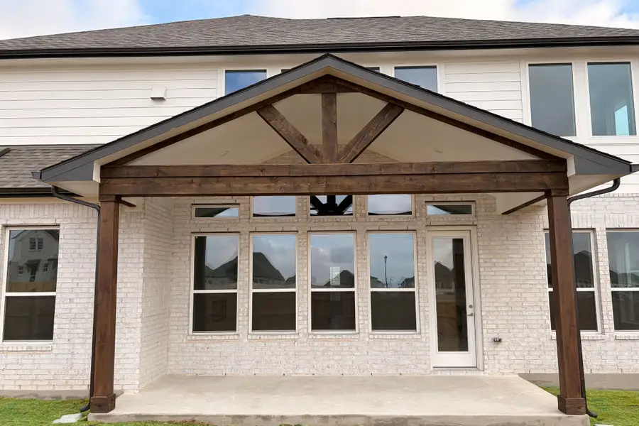 Exterior details and patio area of a home in The Grove at Blackhawk, Pflugerville (Image 3). Exterior details and patio area of a home in The Grove at Blackhawk, Pflugerville (Image 3).
