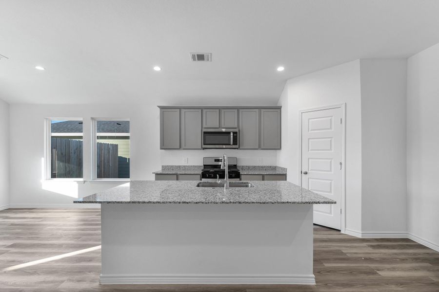 Furnished interior view inside a new home in Reserve at Mallard Lakes, Orange (Image 4). Furnished interior view inside a new home in Reserve at Mallard Lakes, Orange (Image 4).