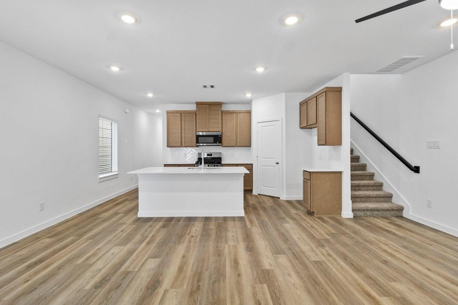 Furnished interior view inside a new home in Grand West, Houston (Image 5).