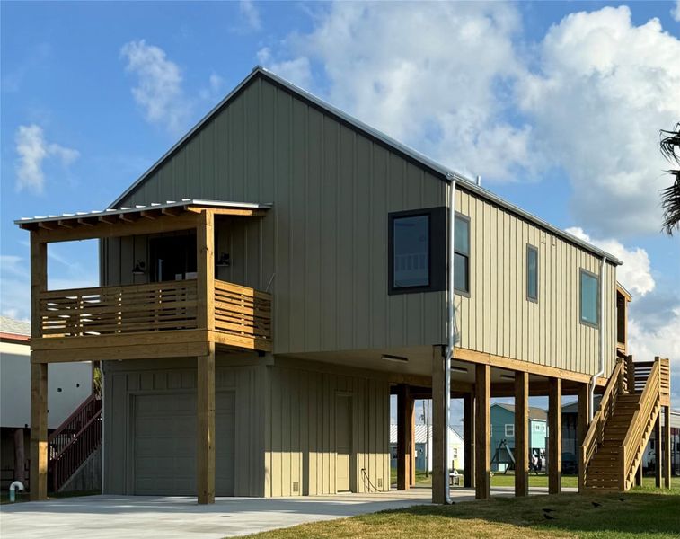 Front exterior of a new home in , Sargent, TX, highlighting curb appeal (Image 14). Front exterior of a new home in , Sargent, TX, highlighting curb appeal (Image 14).