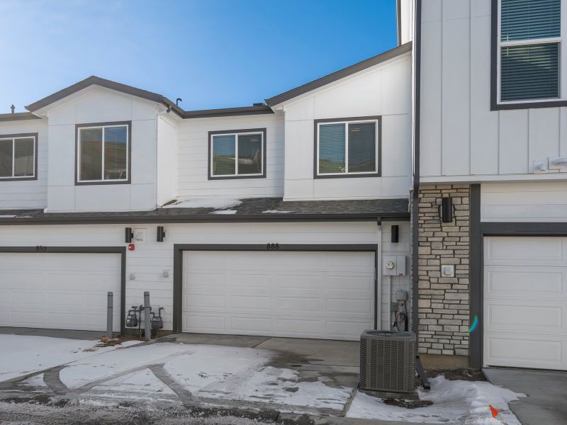 Front exterior of a new home in The Vistas at West Mesa, Colorado Springs, CO, highlighting curb appeal (Image 2).
