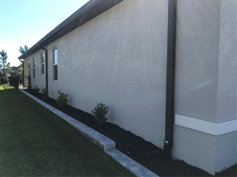 Exterior details and patio area of a home in Del Webb Stone Creek, Ocala (Image 18).