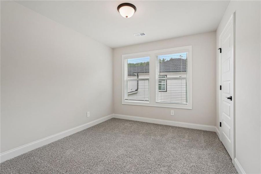 Spacious, unfurnished interior of a new home in Hemingway - Reserve Series, Cumming (Image 42).