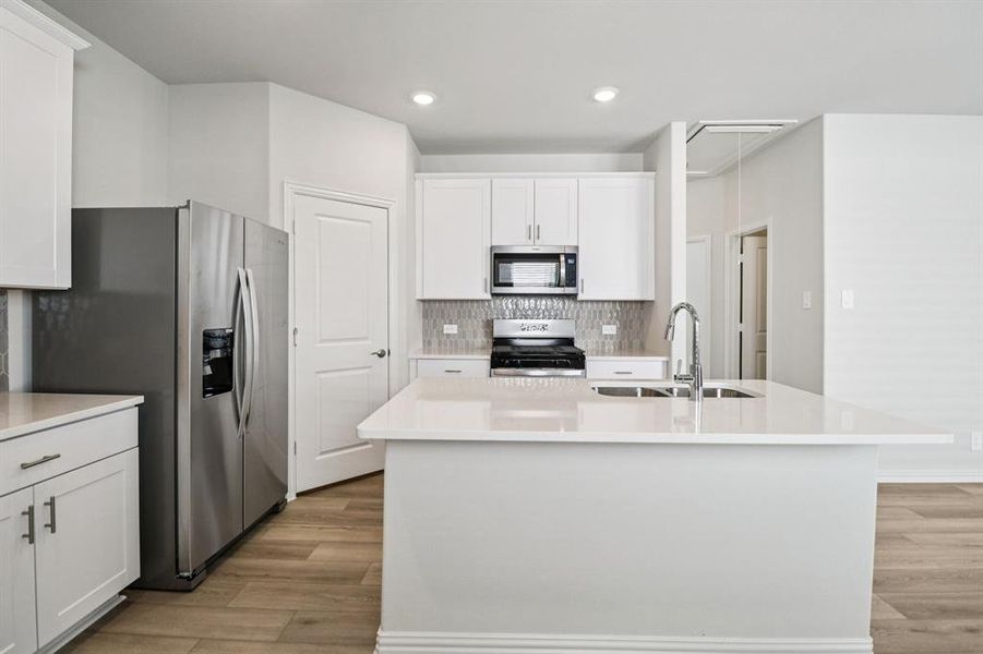Furnished interior view inside a new home in Lakehaven - Spring Series, Farmersville (Image 8).