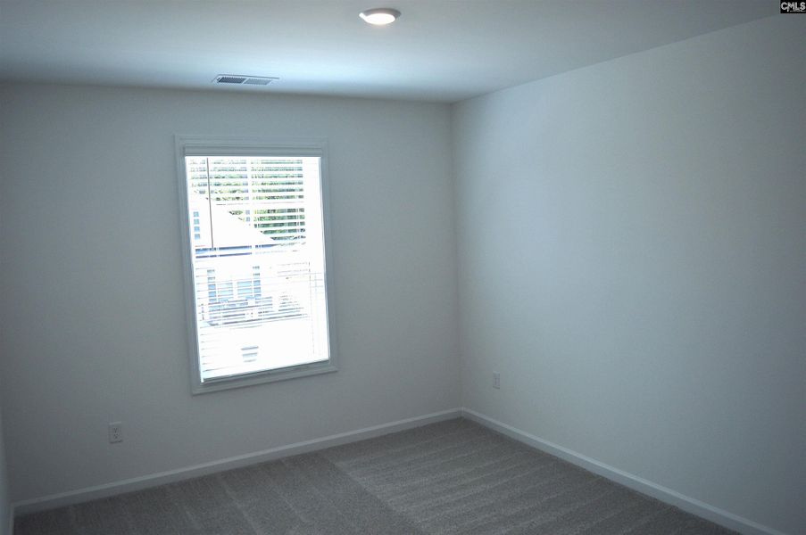 Spacious, unfurnished interior of a new home in Bickley Station, Irmo (Image 22).