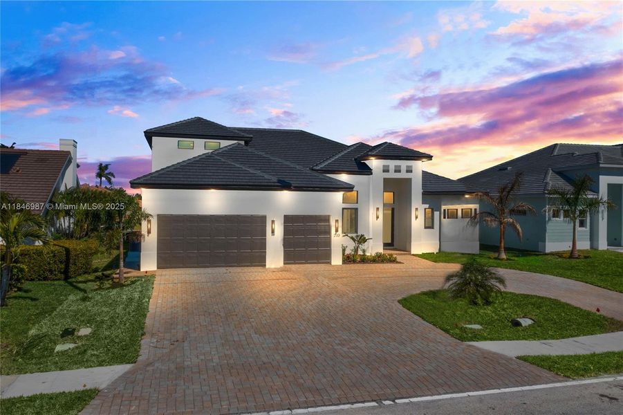 Front exterior of a new home in , Cape Coral, FL, highlighting curb appeal (Image 1). Front exterior of a new home in , Cape Coral, FL, highlighting curb appeal (Image 1).
