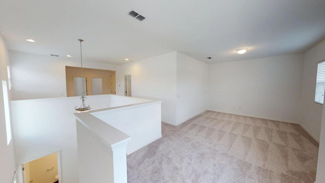 Representative unfurnished interior of a home built from the Berkeley II by Ashton Woods in Weslyn Park, St. Cloud (Image 10).