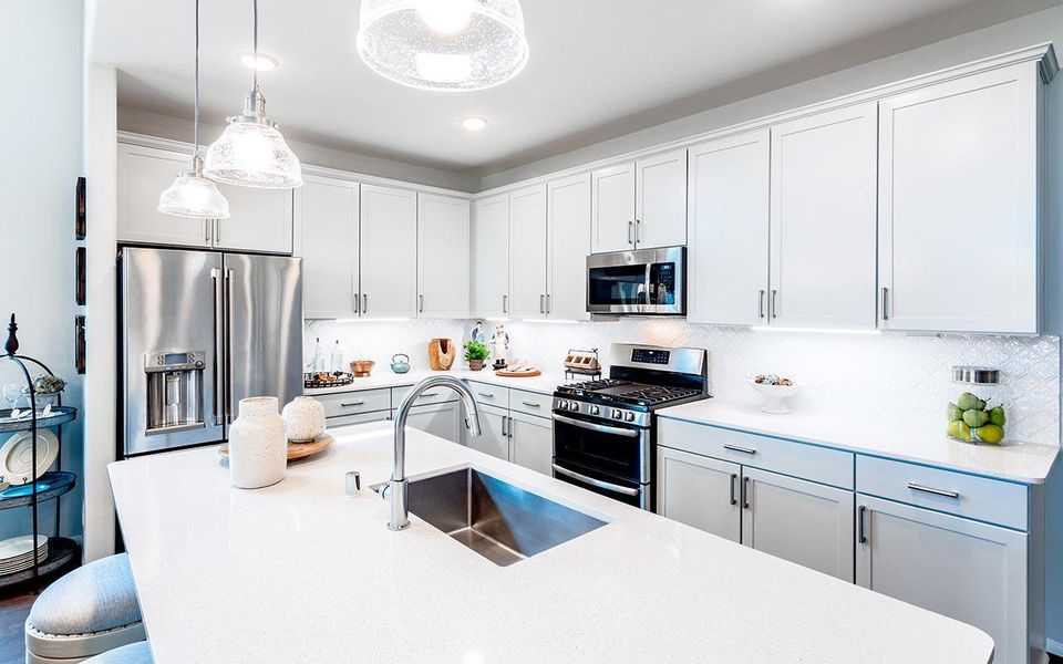 Representative furnished interior of a home built from the Yuma by CastleRock Communities in Sundance Cove, Crosby (Image 12).