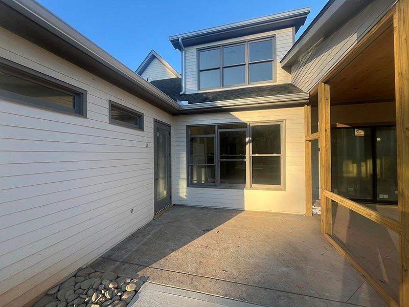 Exterior details and patio area of a home in , White (Image 3).