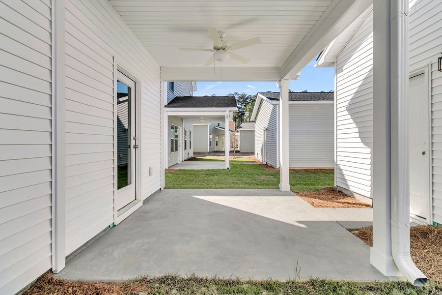 Exterior details and patio area of a home in Six Oaks, Summerville (Image 4).