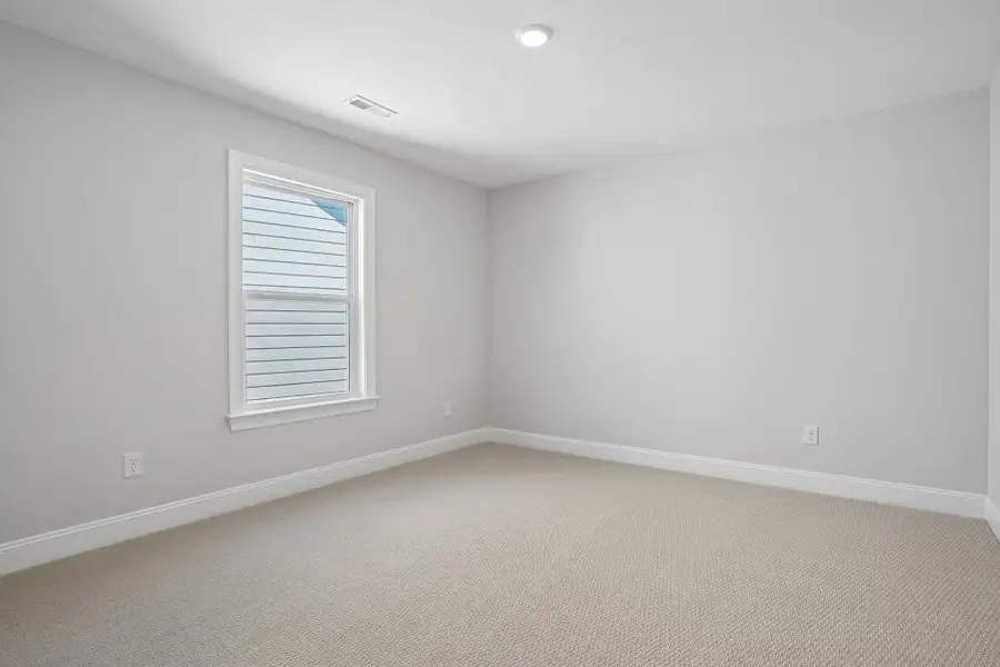 Representative unfurnished interior of a home built from the Fontana by Caruso Homes in Blue Run, Raleigh (Image 27).