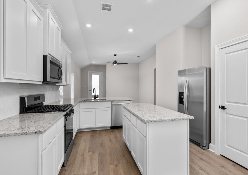 The kitchen has a convenient island. The kitchen has a convenient island.